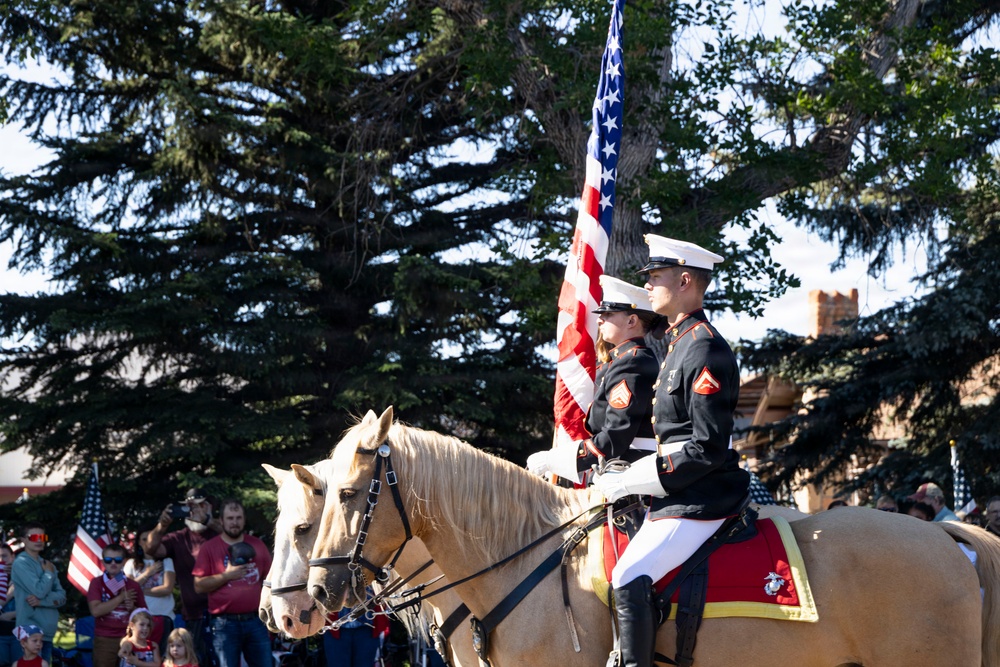 U.S. Marine Corps Mounted Color Guard participates in the Cody Stampede