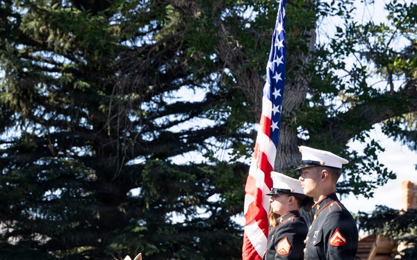 U.S. Marine Corps Mounted Color Guard participates in the Cody Stampede