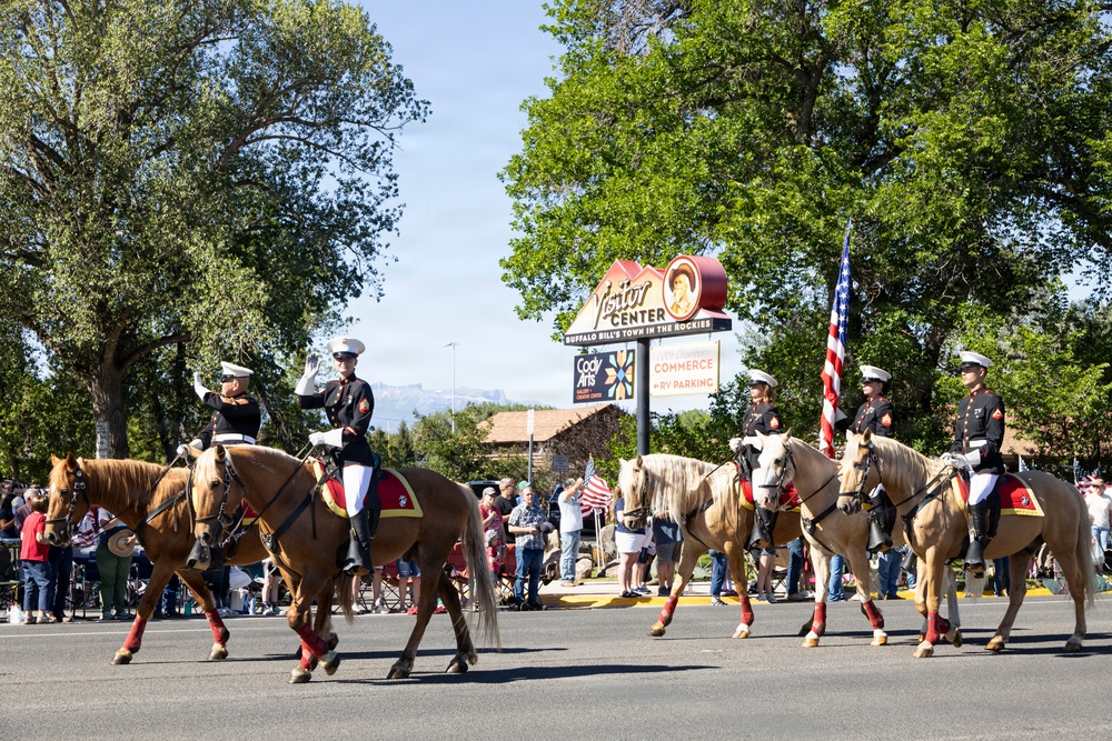 U.S. Marine Corps Mounted Color Guard participates in the Cody Stampede