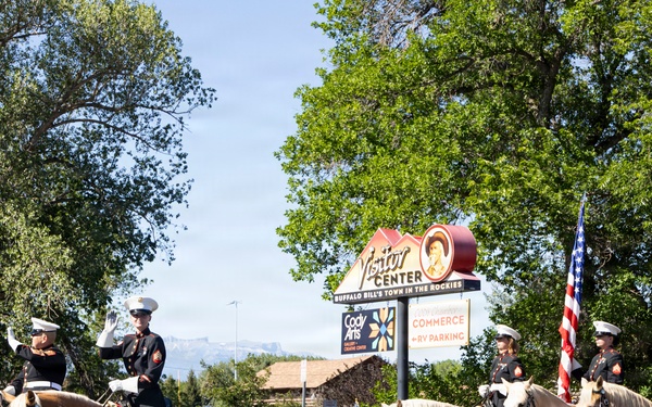 U.S. Marine Corps Mounted Color Guard participates in the Cody Stampede
