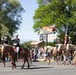 U.S. Marine Corps Mounted Color Guard participates in the Cody Stampede
