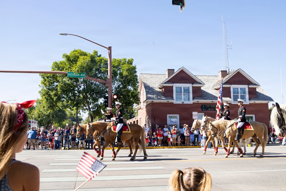 U.S. Marine Corps Mounted Color Guard participates in the Cody Stampede
