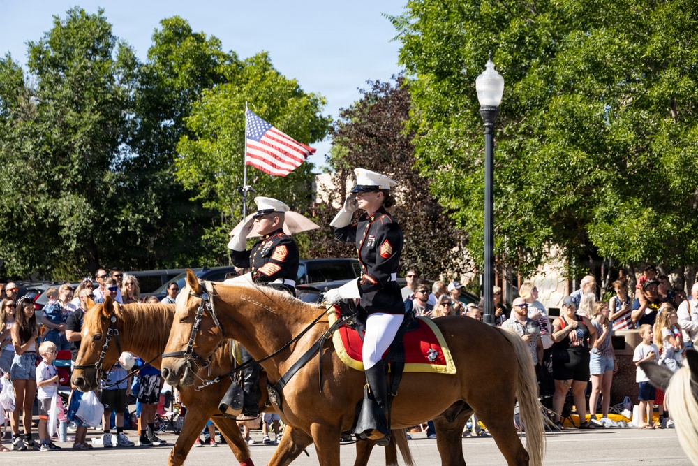 U.S. Marine Corps Mounted Color Guard participates in the Cody Stampede