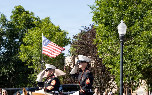 U.S. Marine Corps Mounted Color Guard participates in the Cody Stampede