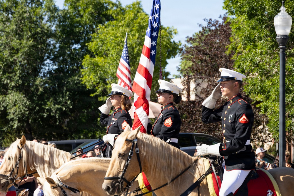 U.S. Marine Corps Mounted Color Guard participates in the Cody Stampede