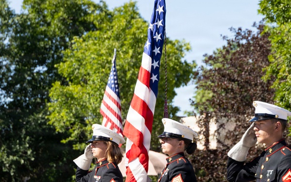 U.S. Marine Corps Mounted Color Guard participates in the Cody Stampede