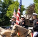U.S. Marine Corps Mounted Color Guard participates in the Cody Stampede