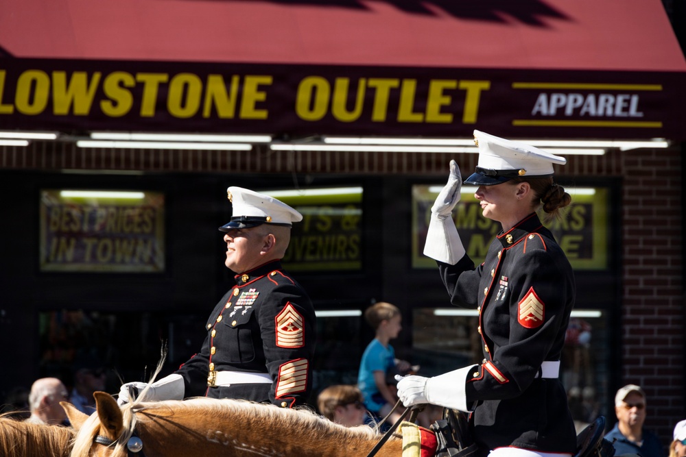 U.S. Marine Corps Mounted Color Guard participates in the Cody Stampede