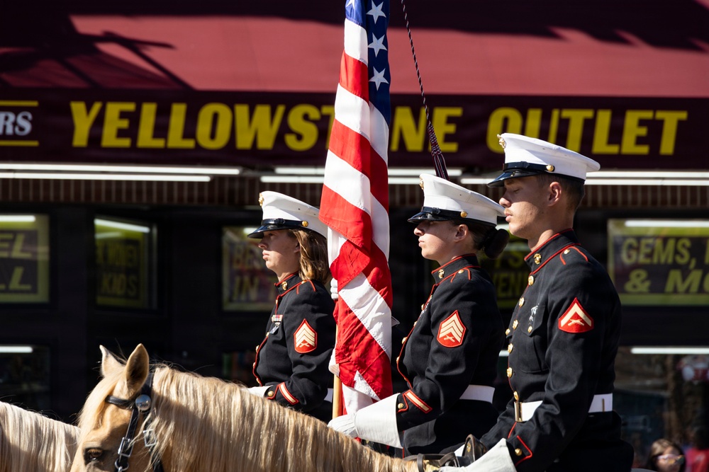 U.S. Marine Corps Mounted Color Guard participates in the Cody Stampede