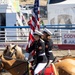 U.S. Marine Corps Mounted Color Guard participates in the Cody Stampede