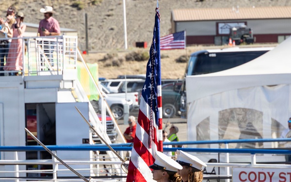U.S. Marine Corps Mounted Color Guard participates in the Cody Stampede