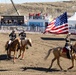 U.S. Marine Corps Mounted Color Guard participates in the Cody Stampede