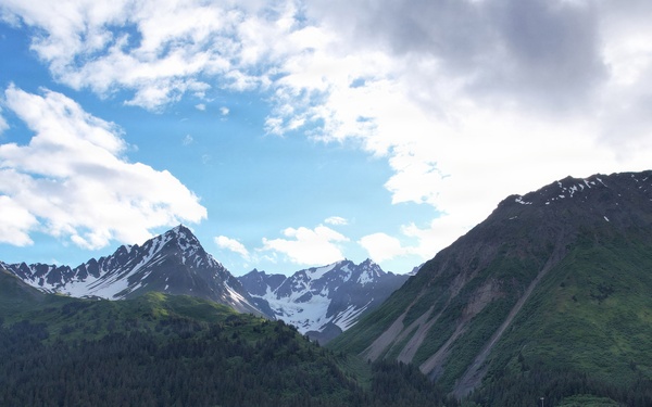 Mountains surround Seward Military Resort during Deployment for Training