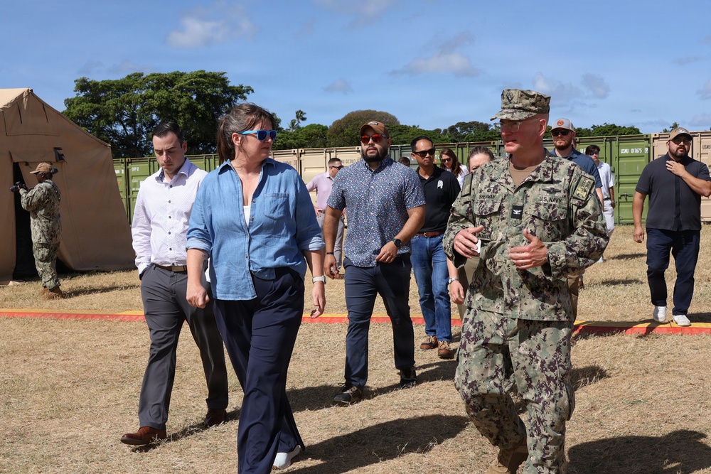 U.S. Navy Capt. Steven Sherman welcomes staff delegates to the humanitarian assistance and disaster relief camp