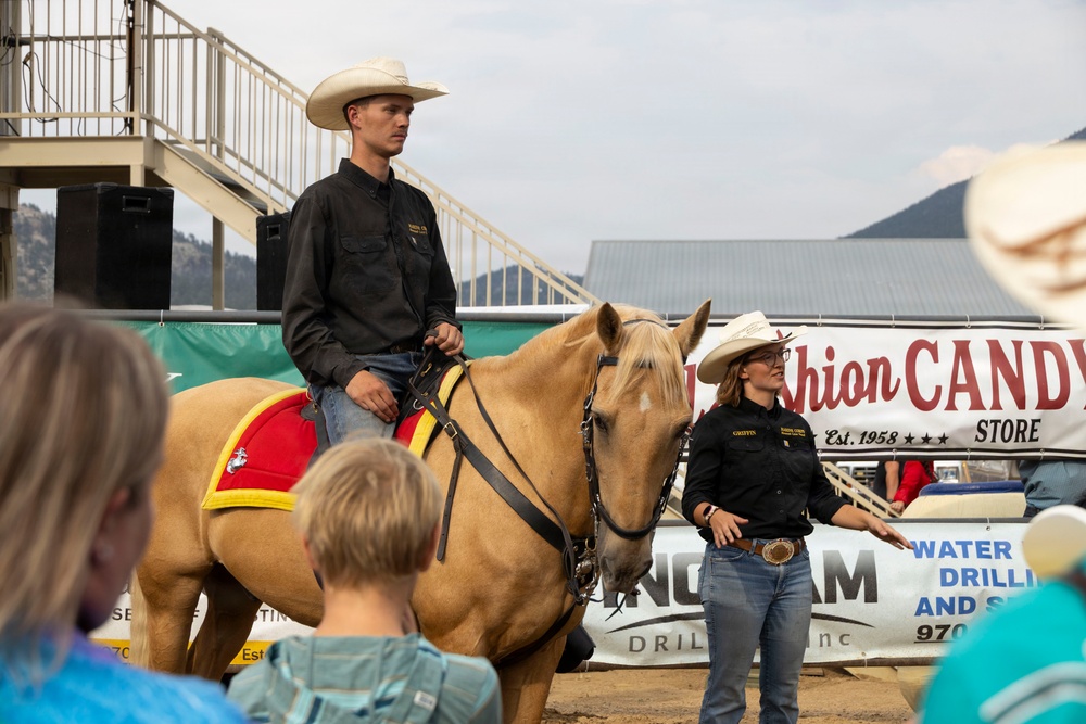 U.S. Marine Corps Mounted Color Guard participates in the Rooftop Rodeo
