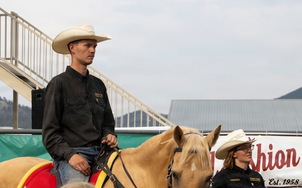 U.S. Marine Corps Mounted Color Guard participates in the Rooftop Rodeo