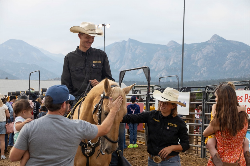 U.S. Marine Corps Mounted Color Guard participates in the Rooftop Rodeo