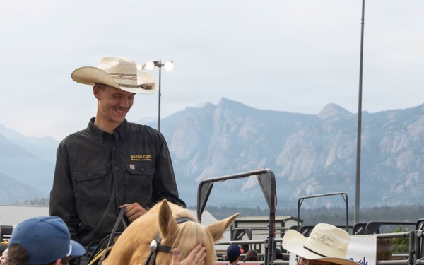 U.S. Marine Corps Mounted Color Guard participates in the Rooftop Rodeo