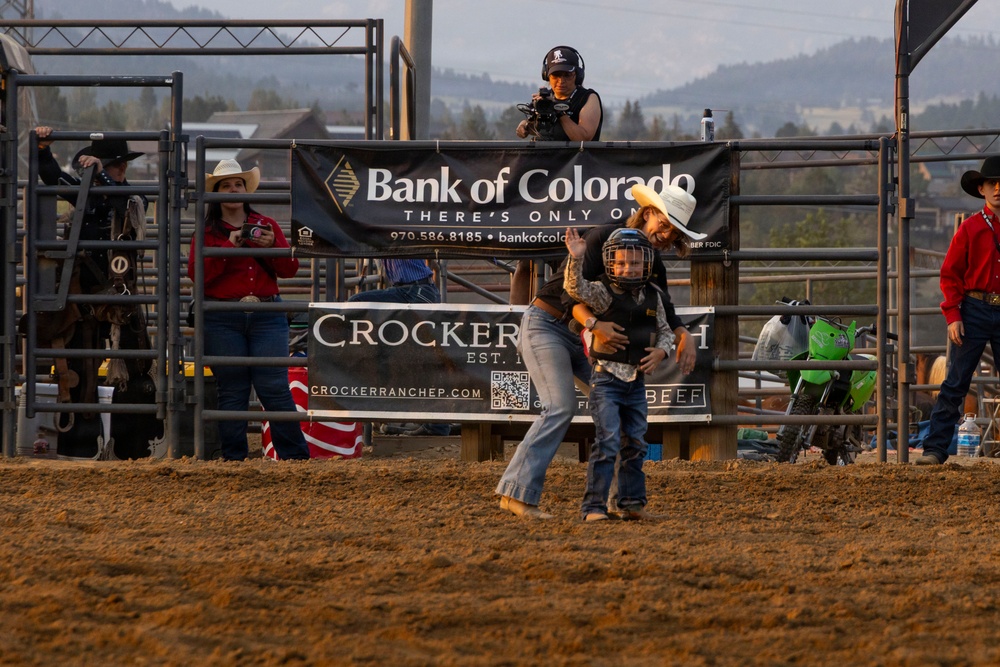 U.S. Marine Corps Mounted Color Guard participates in the Rooftop Rodeo
