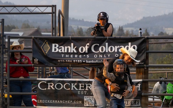 U.S. Marine Corps Mounted Color Guard participates in the Rooftop Rodeo