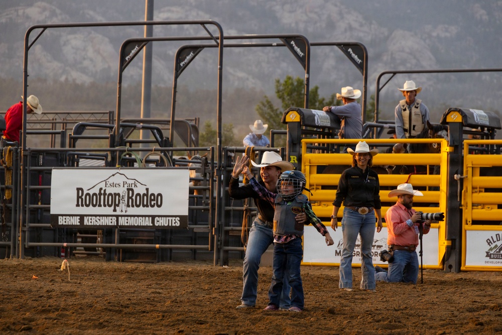 U.S. Marine Corps Mounted Color Guard participates in the Rooftop Rodeo