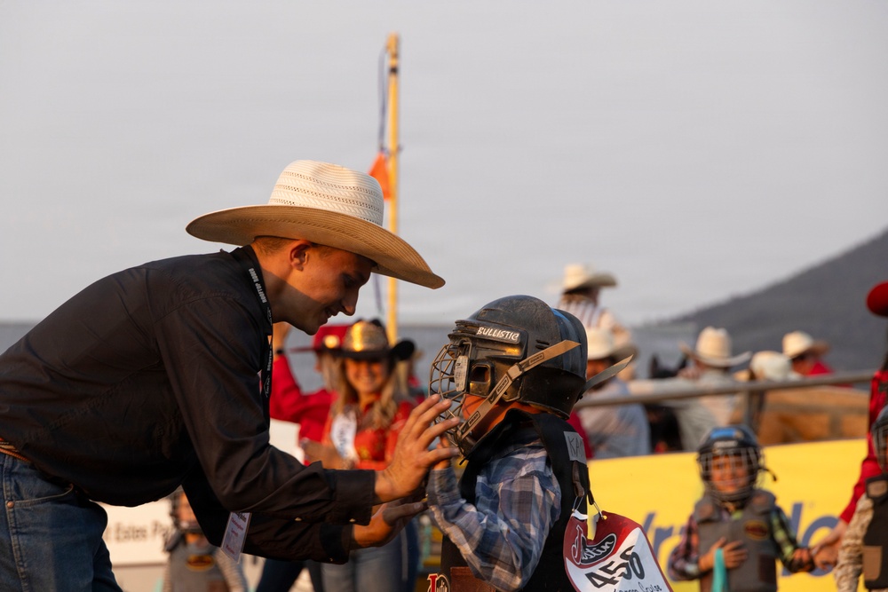 U.S. Marine Corps Mounted Color Guard participates in the Rooftop Rodeo