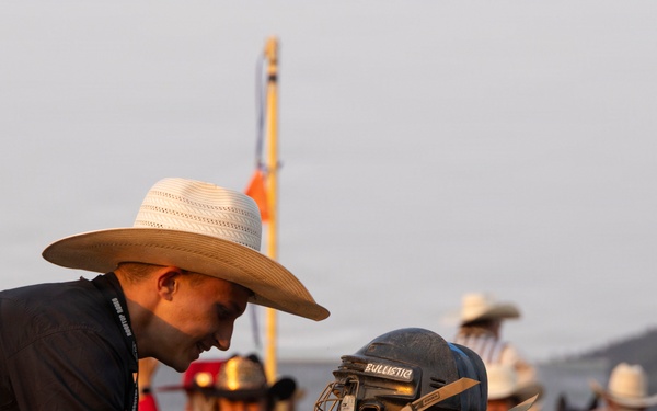 U.S. Marine Corps Mounted Color Guard participates in the Rooftop Rodeo