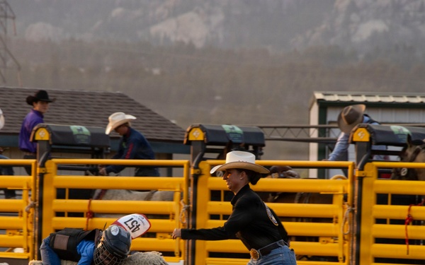 U.S. Marine Corps Mounted Color Guard participates in the Rooftop Rodeo