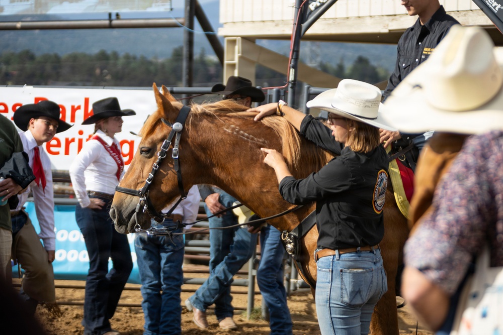 U.S. Marine Corps Mounted Color Guard participates in the Rooftop Rodeo