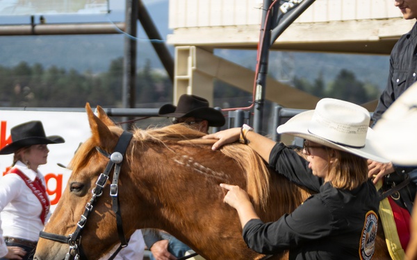 U.S. Marine Corps Mounted Color Guard participates in the Rooftop Rodeo