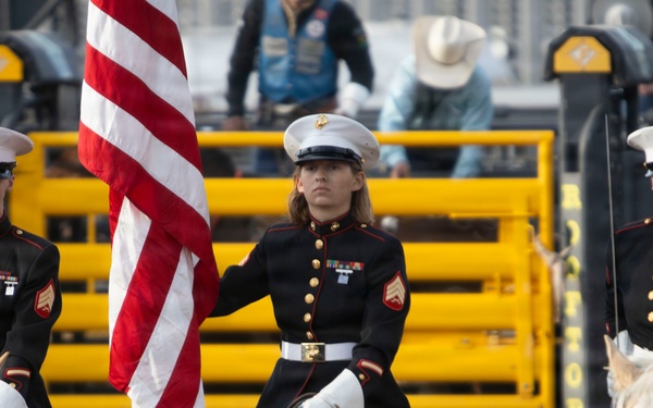 U.S. Marine Corps Mounted Color Guard participates in the Rooftop Rodeo