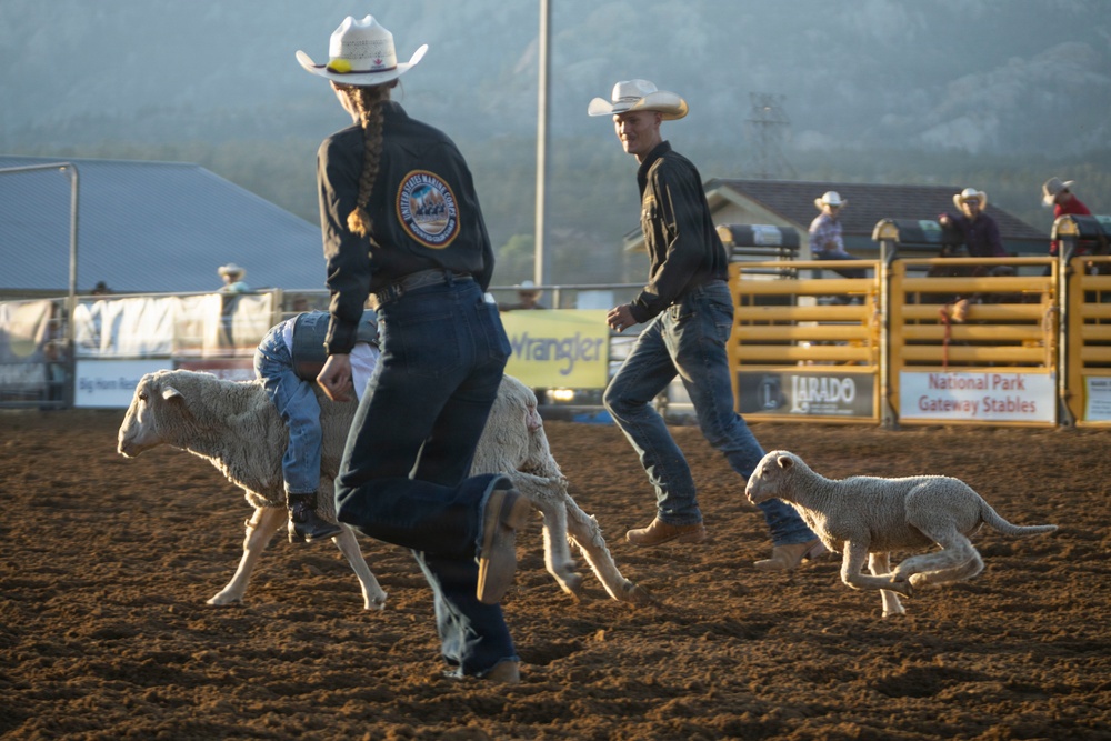 U.S. Marine Corps Mounted Color Guard participates in the Rooftop Rodeo
