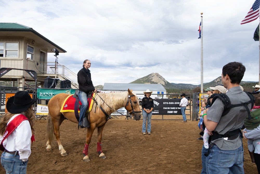 U.S. Marine Corps Mounted Color Guard participates in the Rooftop Rodeo