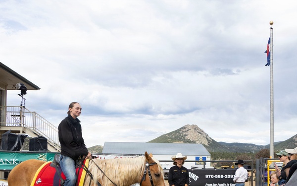 U.S. Marine Corps Mounted Color Guard participates in the Rooftop Rodeo