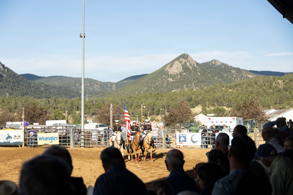 U.S. Marine Corps Mounted Color Guard participates in the Rooftop Rodeo