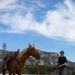 U.S. Marine Corps Mounted Color Guard participates in the Rooftop Rodeo