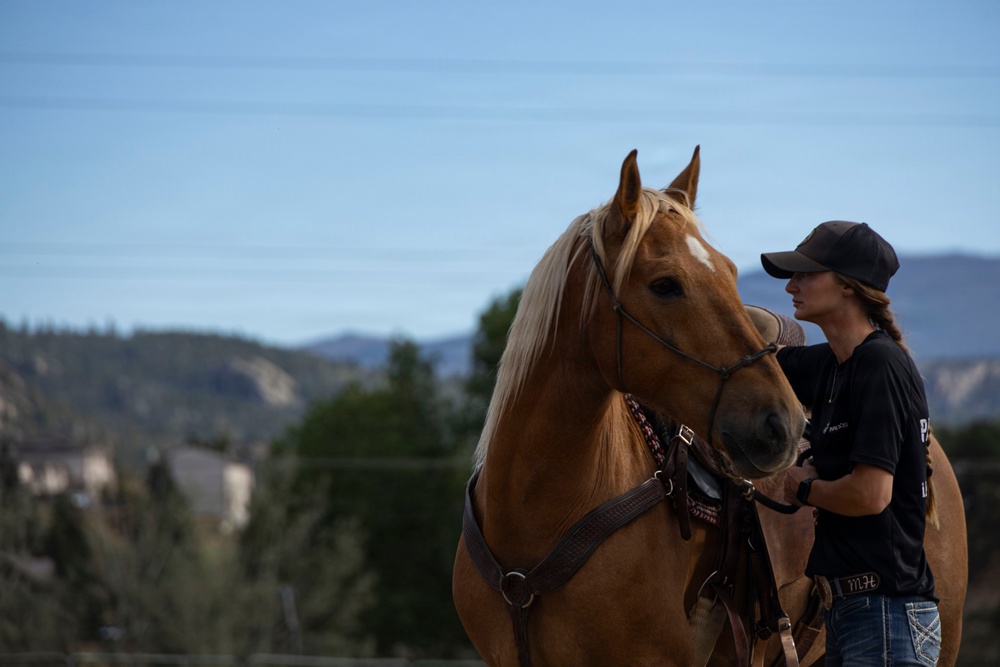 U.S. Marine Corps Mounted Color Guard participates in the Rooftop Rodeo