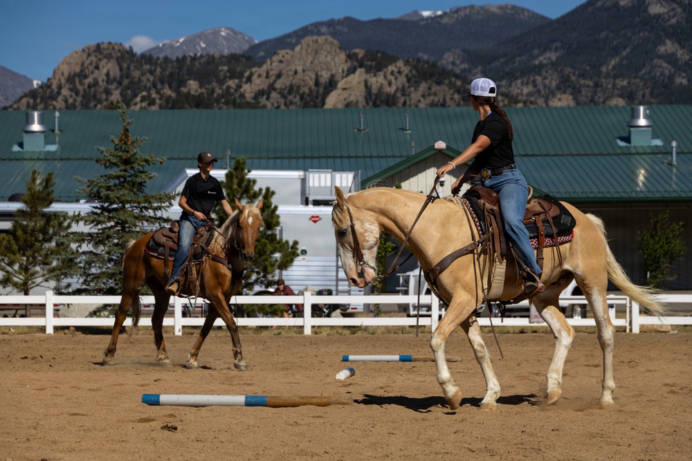U.S. Marine Corps Mounted Color Guard participates in the Rooftop Rodeo