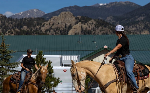 U.S. Marine Corps Mounted Color Guard participates in the Rooftop Rodeo