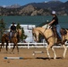 U.S. Marine Corps Mounted Color Guard participates in the Rooftop Rodeo