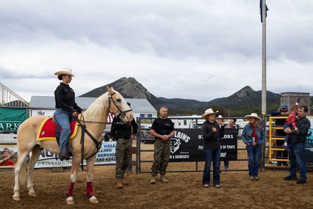 U.S. Marine Corps Mounted Color Guard participates in the Rooftop Rodeo