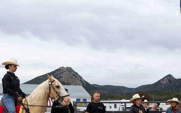 U.S. Marine Corps Mounted Color Guard participates in the Rooftop Rodeo