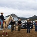U.S. Marine Corps Mounted Color Guard participates in the Rooftop Rodeo