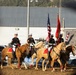 U.S. Marine Corps Mounted Color Guard participates in the Rooftop Rodeo