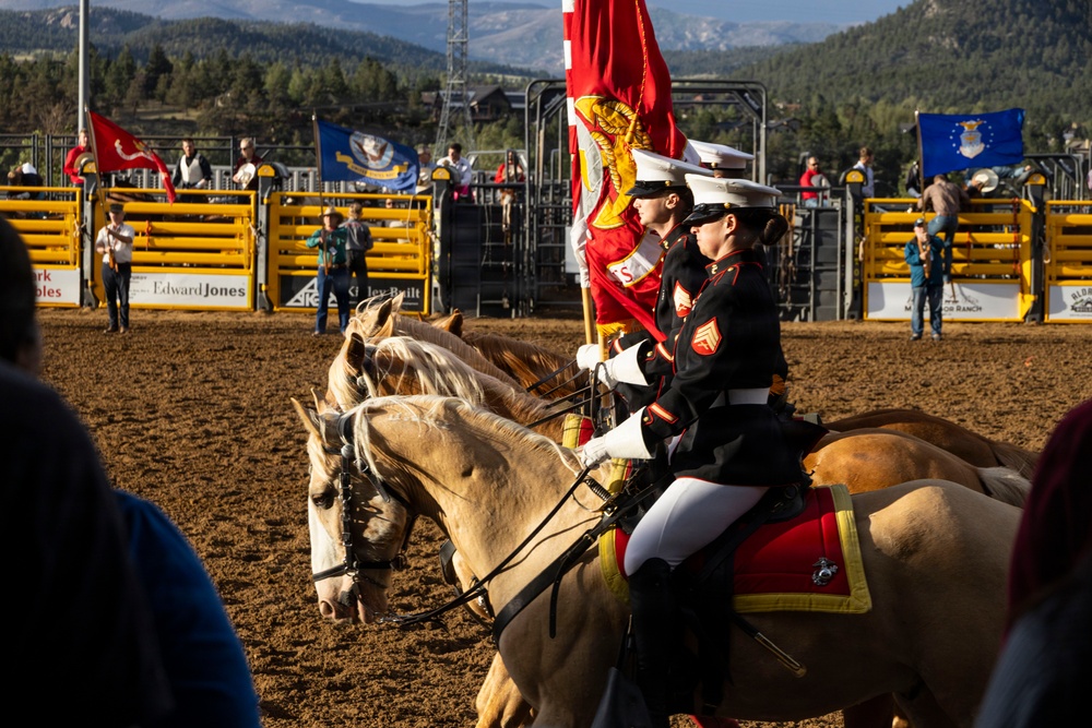 U.S. Marine Corps Mounted Color Guard participates in the Rooftop Rodeo