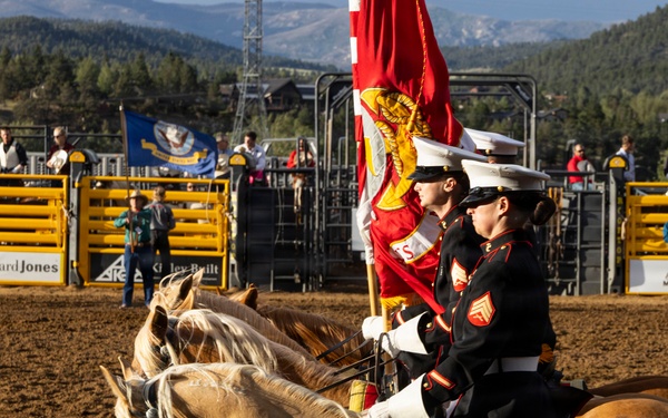 U.S. Marine Corps Mounted Color Guard participates in the Rooftop Rodeo