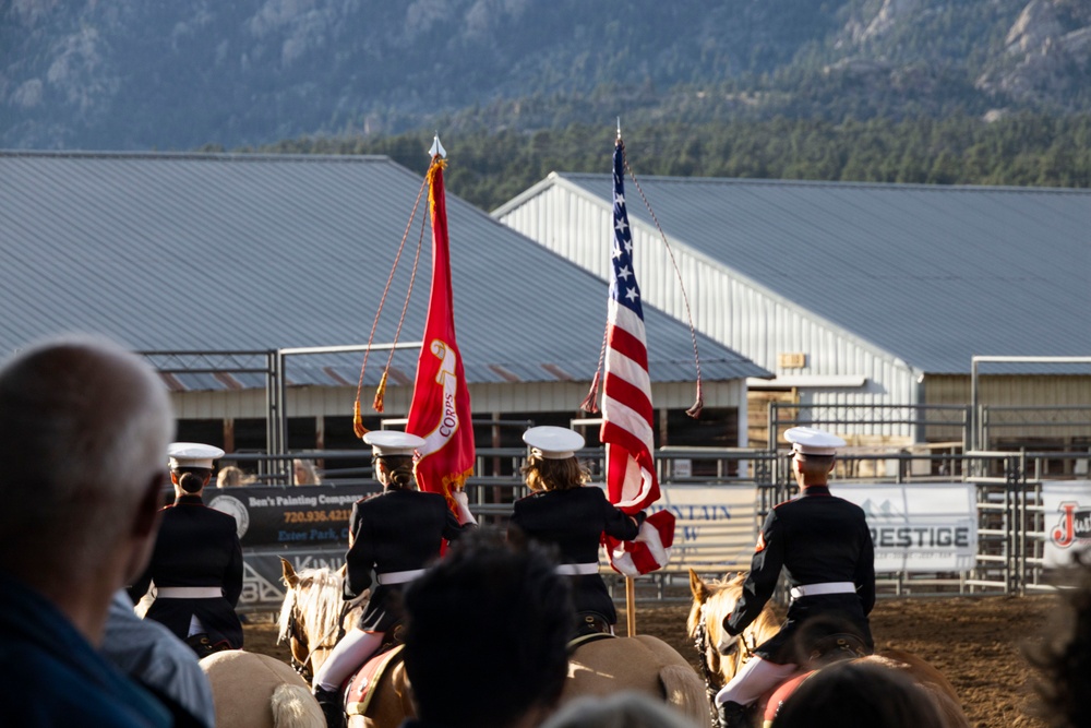 U.S. Marine Corps Mounted Color Guard participates in the Rooftop Rodeo