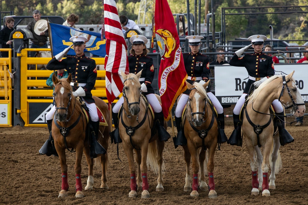 U.S. Marine Corps Mounted Color Guard participates in the Rooftop Rodeo