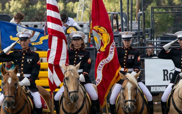 U.S. Marine Corps Mounted Color Guard participates in the Rooftop Rodeo