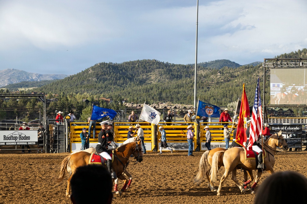 U.S. Marine Corps Mounted Color Guard participates in the Rooftop Rodeo